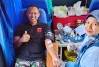 POTRET: antusias seorang warga RW011 Tegal Alur saat mengikuti aksi kemanusian donor darah. (Foto: suararealitas.co)