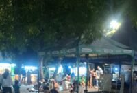 TERPANTAU - puluhan lapak pedagang kaki lima yang berjejer di bina oleh pengelola bernama Udin. Bahkan, lapak liar di Danau Sunter diduga di bekingi oknum, dan pedagang mengaku rutin bayar upeti. (Foto: Ekslusif Suara Realitas/Za).