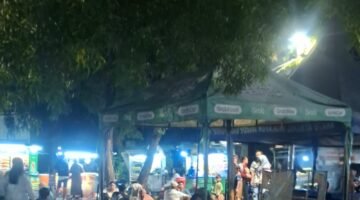 POTRET - Lapak pedagang kaki lima yang di bina oleh pengelola bernama Udin. Lapak Liar Danau Sunter Diduga Dijaga Beking, Pedagang Mengaku Rutin Bayar Upeti