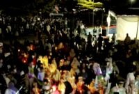 POTRET - sekitar 1.200 peserta pawai obor dari Sunter Agung memadati pelataran Jakarta International Stadium (JIS). (Foto: Istimewa).