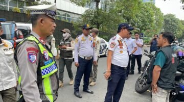 Sudinhub Pasang Enam Spanduk Larangan Parkir di Kawasan CNI